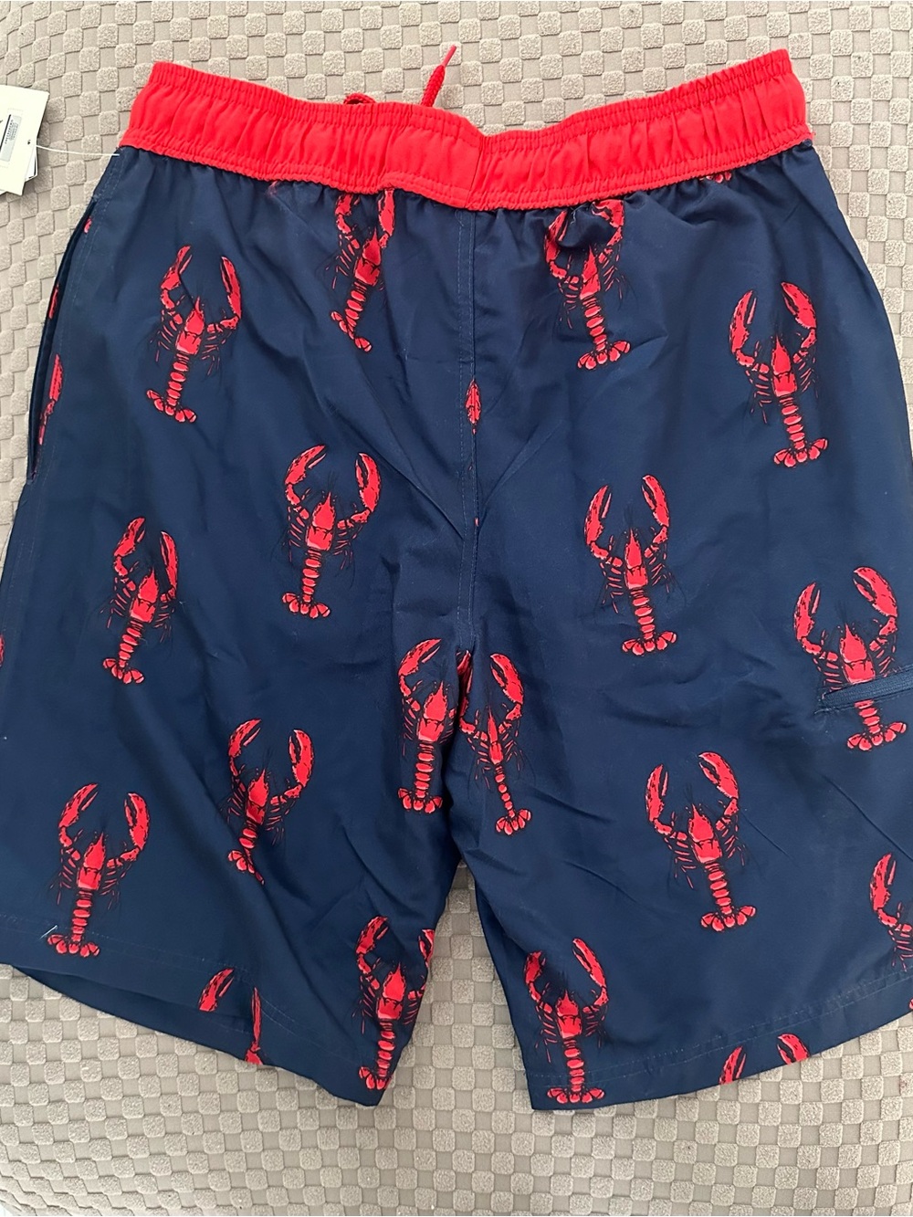 U.S. Polo Assn. Navy Swim Trunks with Red Lobster Print and Red Waistband